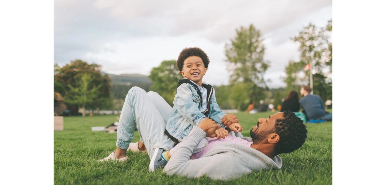 Father and son playing in the park